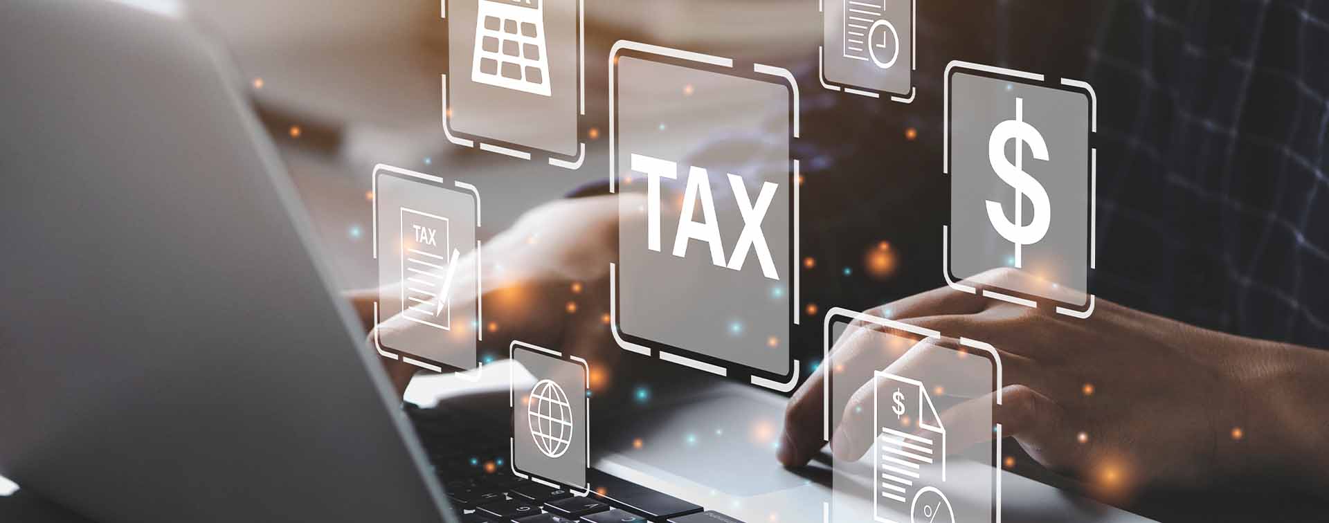 Business person using a computer to complete Individual income tax return form online for tax payment.